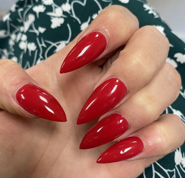 Long glossy red stiletto nails